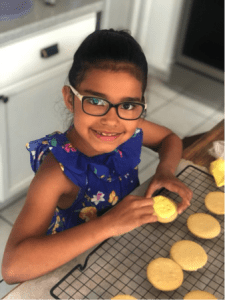 Maia making cookies