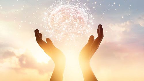 Abstract palm hands touching brain with network connections, innovative technology in science and communication concept